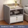 Mesa de noche pequeña moderna y simple para el hogar con almacenamiento con gabinete de almacenamiento con cerradura estante dormitorio mini gabinete simple de celebridad de Internet