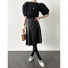 Otoño 2024 Nuevo Corea del Sur Chic Retro Cintura Alta Adelgazante Combinable en Todo Cuero PU Falda Plisada 2 Colores