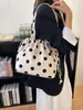 Bolso informal transfronterizo de gran capacidad con lunares para mujer, nuevo bolso de hombro versátil para el verano de 2026, bolso tote estilo bosque para el trabajo