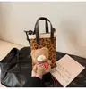 Venda Quente Transfronteiriça Bolsa Transversal Estampa de Leopardo Ursinho Feminina 2026 Nova Doce Descolada Versátil Bolsa de Mão Mini Fofa para Celular