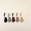 Diseño simple se refiere a guantes de punto para niños, guantes de lana de una sola capa cálidos de invierno, manoplas de estilo colgante para bebé con correa para el cuello