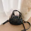 Bolsa de Bolos Portátil Linda Estilo Coreano Modelo Nuevo 2026 Bolso Plegado con Textura Simple Bolso de Hombro Cruzado de Moda