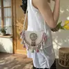 Bolso de Paja Tejida Estilo Étnico para Mujer, Nuevo Diseño de Nicho Verano 2026, Bolso de Hombro Cruzado Único, Bolso Silla de Montar de Alta Gama