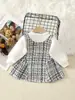 Atacado de Roupas Infantis para Comércio Exterior de Outono, Laço na Cintura Frontal, Vestido Longo de Manga Longa para Meninas Estilo Pequena Chanel, Entrega em Peça Única, Estampa Xadrez
