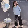 Conjunto Novo de Meninas para Primavera/Outono 2026 Manga Longa Design Versátil Zíper na Blusa Combinado com Calça Wide Leg Tendência