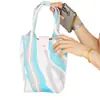 Bolsa de punto portátil de dibujos animados al por mayor, bolso de mano simple personalizado, bolso de punto tipo Ins para niñas
