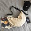 Bolso estilo coreano transfronterizo para mujer ins ropa de trabajo Bolso para hombre simple chic ligero casual dumpling bandolera suministro de fábrica