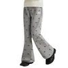 Calça de Moletom Feminina de Outono para Crianças Médias e Grandes, Estampa Completa de Laço, Levemente Flare, Modelagem Justa, Calça Estilosa
