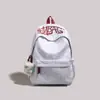 Mochila Casual Simple de Estilo Nuevo para Verano 2026 para Estudiantes, Alto Valor Estético, Gran Capacidad, Bolso Escolar con Bordado de Letras Personalizado
