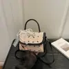 Bolso cruzado de hombro casual a la moda, diseño de nicho, bolso de mujer moderno y elegante, nuevo bolso cuadrado pequeño de verano 2026