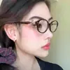 2025 Nuevas Gafas Retro Saturno Estilo Japonés Marco Rojo-Marrón Puro Deseo Gafas de Lectura con Filtro de Luz Azul Marco Negro Aspecto Natural Artefacto
