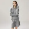 Suéter de cachemira 2026 Estilo Otoño/Invierno para mujer con capucha tejido de ochos capa base estilo dulce conjunto de dos piezas suéter cálido de temperamento
