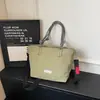 Bolso tote grande de estilo casual para mujer, nuevo modelo 2026, bolso de mano de color liso para ir al trabajo, bolso de hombro/cruzado ligero y simple