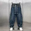 Jeans Scimitar Nuevos para Hombre Primavera y Otoño 2024 Moda Calle Alta Estilo Americano Casual Holgados Rectos Cordón Pantalones Harem