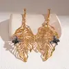 Pendientes Metálicos de Mariposa y Hoja Hueca Estilo Europeo y Americano, Pendientes Únicos de Estilo Vintage de Gama Alta de Nicho Transfronterizo