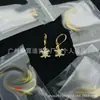 5.4 Colección Nuevo Modelo Europeo y Americano Transfronterizo, Réplica con Etiquetas, Venta Directa al Por Mayor de Pendientes de Lv, Hermes, Chanel, Dior y Fendi