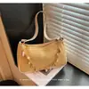 2026 Nuevo Bolso de Hombro Versátil de Moda Baker Perla Diseño Creativo Bolso de Axila Bolso de Personalidad para Viajes Bolso de Mujer