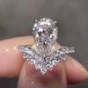 Anillo de Nueva Corona de Cao Shi Incrustado con Zirconia en Forma de Gota de Agua y Pera Anillo para el Dedo Anillo de Compromiso para Mujer de Cobre Chapado en Oro Blanco