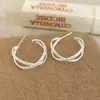 Pendientes Redondos de Cruz Geométricos de Lujo Ligero y Gama Alta Diseño Elegante de Nicho Pendientes Versátiles Elegantes y de Moda para Ropa de Trabajo