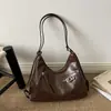 Bolso de hombro tipo tote casual de gran capacidad transfronterizo para mujer, nueva colección otoño 2026, mochila cruzada para el trabajo, venta al por mayor
