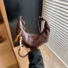 Bolso tipo empanada de diseño retro de nicho transfronterizo, bolso cruzado moderno para el día a día, bolso de hombro único a la moda, bolso de cuerno para debajo del brazo