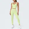 Conjunto de outfit de yoga ajustado con diseño deportivo en la espalda, de tela cepillada con bloques de color transfronterizos, sensación nude, pantalones largos de cintura alta para levantar glúteos para correr y fitness