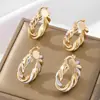 [Transfronterizo] Pendientes Geométricos Retorcidos Chapados en Cobre Dorado Estilo Europeo y Americano Anillo Retorcido Pesado Personalizado Tubo Retorcido Suministro Directo de Fábrica en Stock