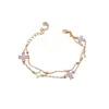 Pulseira geométrica floral oca em formato de diamante de zircônia, um acessório luxuoso e de alta qualidade, uma joia única e estilosa que complementa qualquer look, projetada para mulheres.