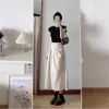 Falda plisada de color liso para mujer, nueva para la primavera y el verano 2026, falda de línea A de cintura alta con falda de paraguas fluida, falda casual de longitud media
