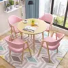 Conjunto de mesa e cadeiras para negociação loja comercial recepção reunião mesa redonda pequena área de descanso simples casual uma mesa quatro cadeiras mesa de jantar