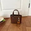 Bolsa Balde Portátil Nova Moda Simples Outono 2026 Retrô Chique para o Dia a Dia Estilo Coreano Bolsa de Ombro Único Transversal