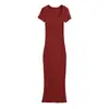 Chica sexy picante muestra figura vestido largo de un solo paso para mujer verano nuevo elástico ajustado cuello trapezoidal manga corta vestido de cadera