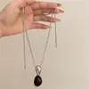 Colar com Pingente Oval de Resina Luxo Leve Temperamento Retrô Corrente para Clavícula Nicho Versátil Joias Personalizadas de Alta Qualidade Atacado
