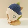 Gorro de lana tejido con protección para los oídos para niños y bebés, transfronterizo, con etiqueta de tela elegante, correas de colores caramelo para niños y niñas