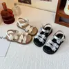 Sandalias para Niñas Estilo Coreano Moño Niña Pequeña Punta Abierta Zapatos de Playa 2026 Nuevo Verano Versátil Zapatos de Princesa