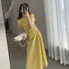 Vestido feminino, nova coleção de verão 2026, com design vazado, elegância estilo francês, silhueta que afina a figura, cintura marcada e um vestido longo inspirado em Hepburn, perfeito para o verão e um estilo de nicho