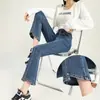 Calça Jeans Split Micro-Lar Feminina Primavera e Outono Irregular 2025 Nova Pantalona de Nove Pontos com Barra Flare para Corpo Pera Pequeno