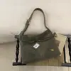Bolsa Tote de Grande Capacidade Outono e Inverno para Mulheres 2025 Novo Estilo Popular Este Ano Retro Nicho Bolsa de Ombro Transversal para o Dia a Dia
