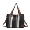 Bolsa de lona transfronteriza, gran capacidad, bolsa simple de rayas estilo coreano para el día a día, bolso de hombro para mujer, bolso tote moderno y versátil