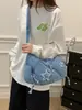 Bolso vaquero lavado versátil casual estilo coreano transfronterizo 2026 nuevo estilo bordado de letras personalizado bolso de hombro cruzado