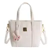 Bolsas de Lujo de Nicho en Relieve para Mujer 2025 Nuevo Otoño Bolso Cruzado Casual Bolso de Mano de Moda Elegante Bolso Cubo