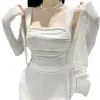 Roupas Femininas de Celebridade da Internet Coreia Dongdaemun 2025 Novo Conjunto de Duas Peças Moda com Regata Justa Sexy de Gola Quadrada + Cardigã