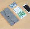 Los fabricantes fabricaron a medida una variedad de estilos de estuche para lápices de fieltro portátil, estuche para gafas, monedero de fieltro para monedas, bolsa para teléfono móvil de fieltro