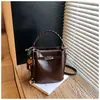 Bolso de Mano Versátil Estilo Coreano Transfronterizo Bolso Cubo para Mujer 2025 Primavera Nuevo de Moda Retro Sensación de Alta Gama Bolso de Hombro Único Cruzado