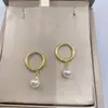 Pendientes de Perla Japoneses y Coreanos de Venta Caliente Transfronterizos para Mujer, Clásicos Modernos Elegantes, Pendientes de Celebridad de Internet, Pendientes de Lujo Ligero y de Gama Alta