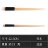 Venta al por mayor de fábrica Palillos de madera de ala de pollo de haya Sándalo rojo Madera de loto Vajilla de madera para el hogar Palillos de sushi Palillos de madera japoneses