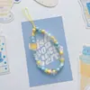 Muñeca Linda de Dibujos Animados Cadena Hecha a Mano Cordón Colgante Adorno Colgante Cordón para Teléfono Bolso con Cuentas para Cámara Colgante para Teléfono