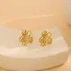 Pendientes de metal con diseño de mariposa y flor, estilo personalidad, Europa y Estados Unidos, para mujer, con sentido exagerado, textura plisada, joyería para orejas