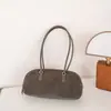 Bolso de piel de vaca mate 2026 otoño e invierno nuevo, versátil, simple, para mujer, bolso de hombro/bajo el brazo de gamuza retro de nicho, tipo baguette