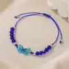 Pulsera tejida de mariposa al por mayor transfronterizo, pulsera de cuentas para parejas y amigos, pulsera de cordón de cera ajustable con mariposa de aleación
